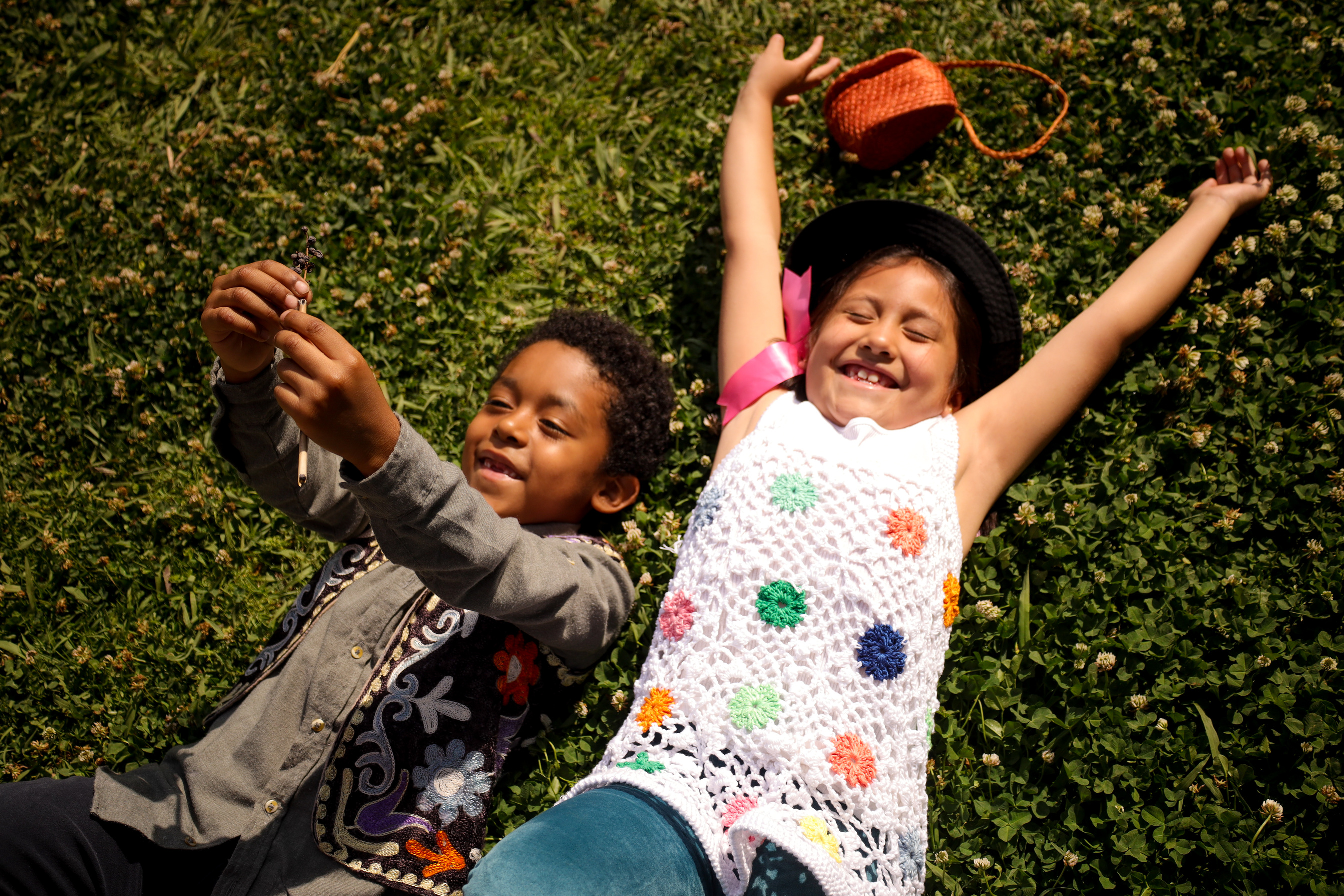 Happy Kids Lying on the Grass